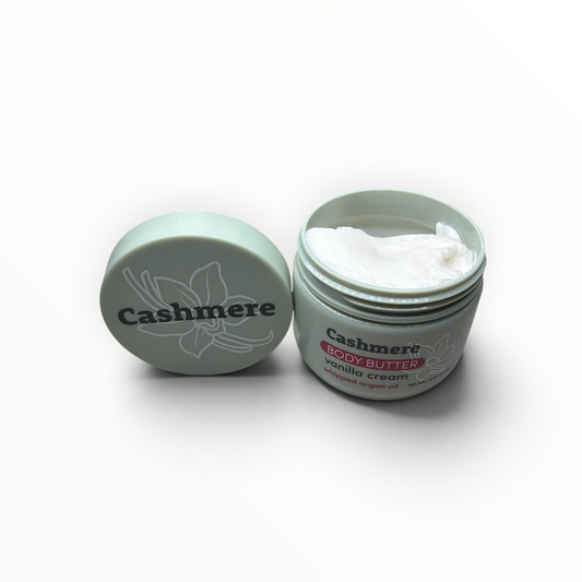 Open jar of Cashmere Vanilla Cream Whipped Argan Oil Body Butter showing whipped texture