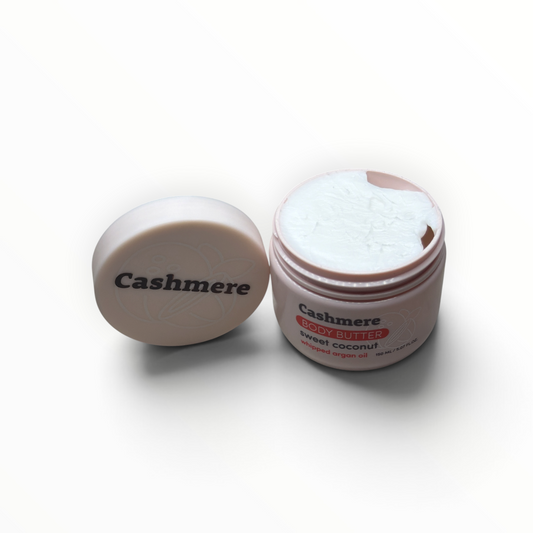 Open jar of Cashmere Sweet Coconut Whipped Argan Oil Body Butter showing whipped texture