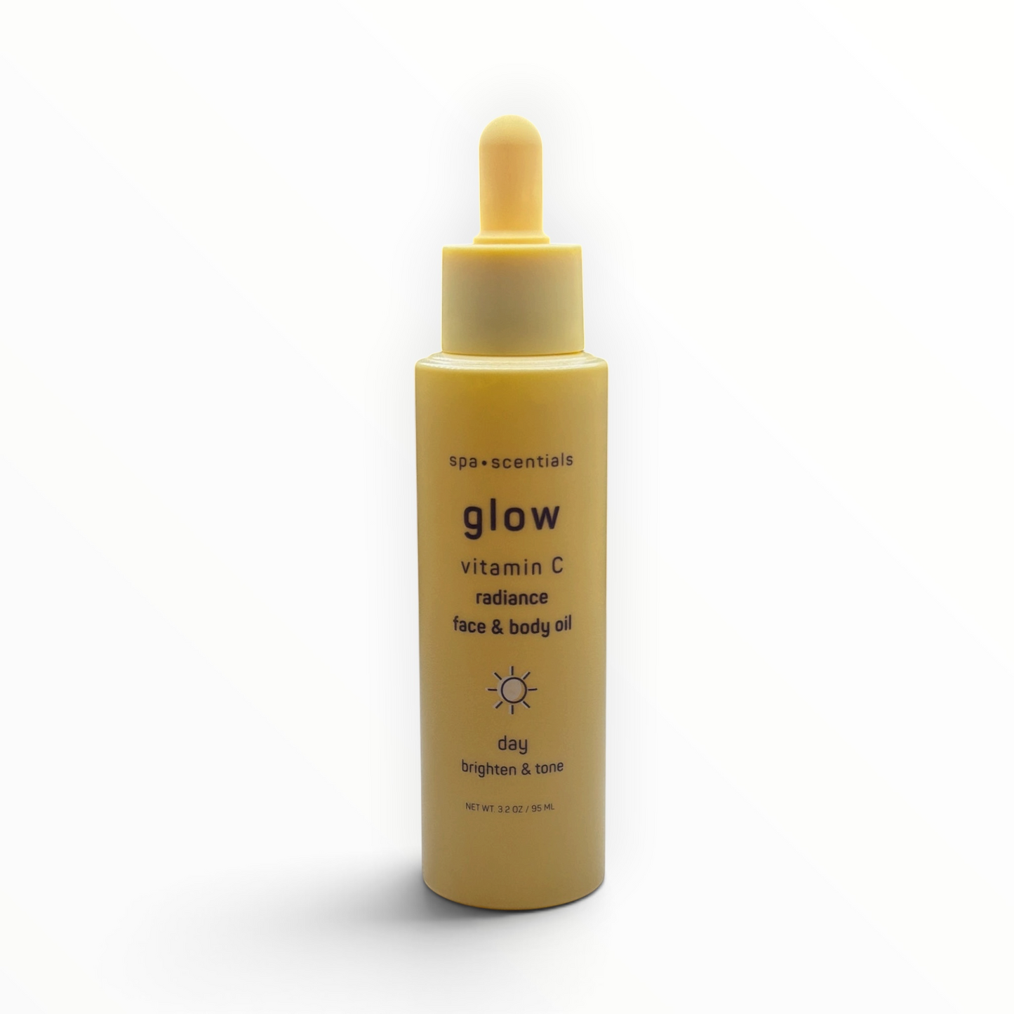 Aceite facial y corporal MTP Commerce Spa Scentials Glow con vitamina C en frasco amarillo con aplicador de gotero