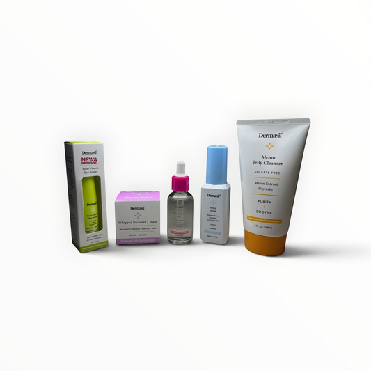 Dermasil Labs five-piece facial care set with cleanser, serums, recovery cream, and eye roller