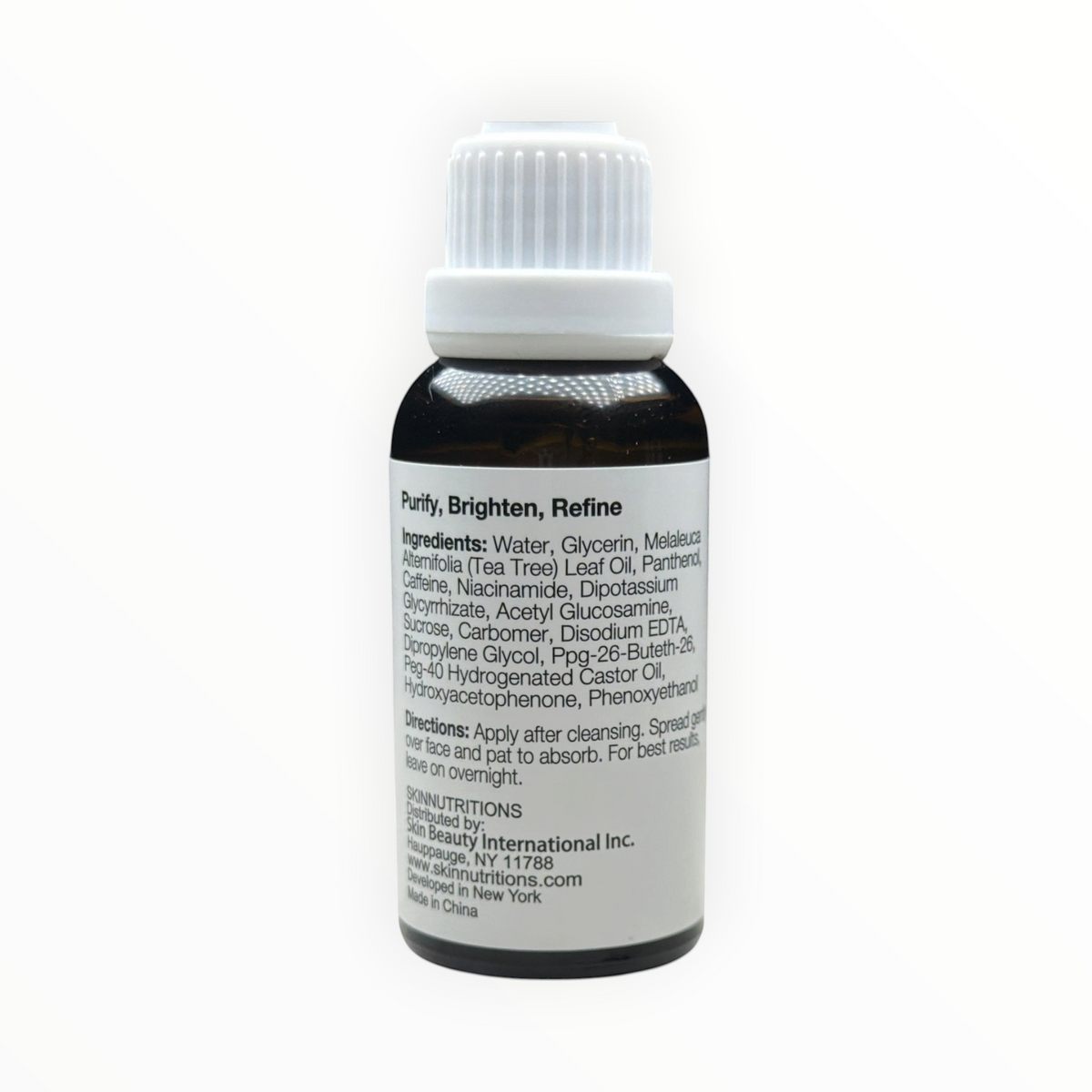 Etiqueta trasera del serum MTP Commerce Skin Nutrition con lista de ingredientes y modo de uso en frasco ámbar