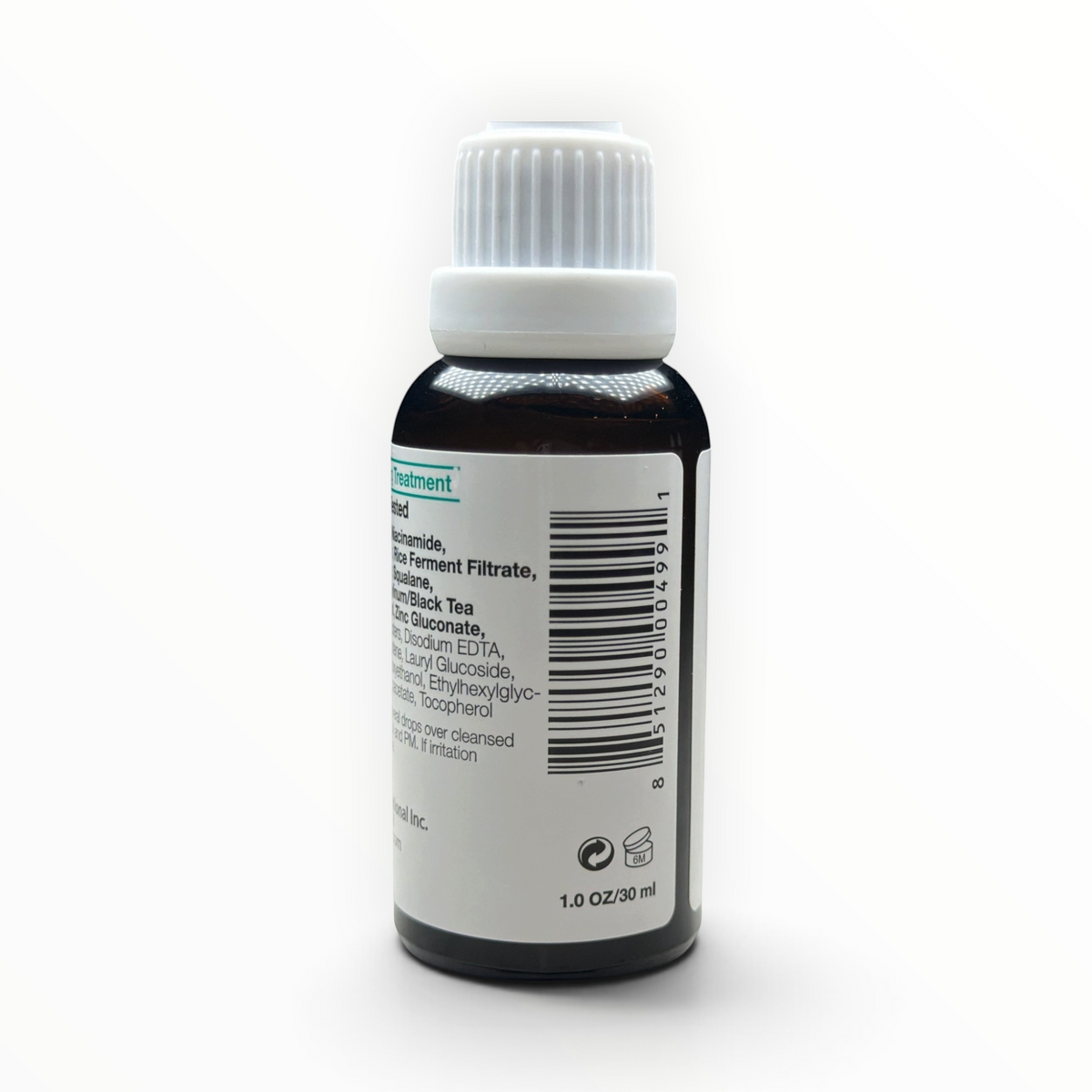 Etiqueta trasera del suero facial MTP Commerce Skin Nutrition Botanicals con lista de ingredientes y código de barras