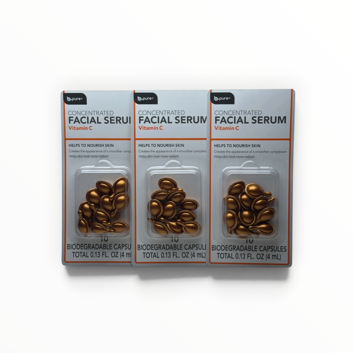 Tres paquetes de MTP Commerce b.pure suero facial de vitamina C en cápsulas biodegradables color cobre